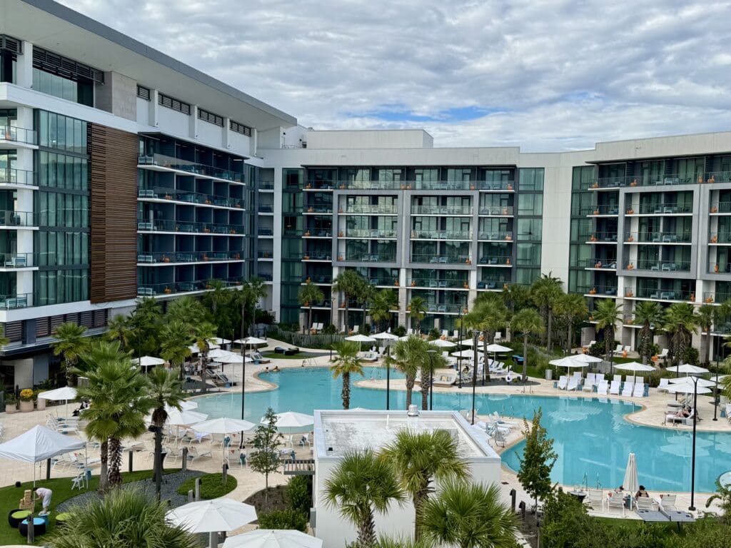 Image of the Conrad hotel at Evermore with pool.