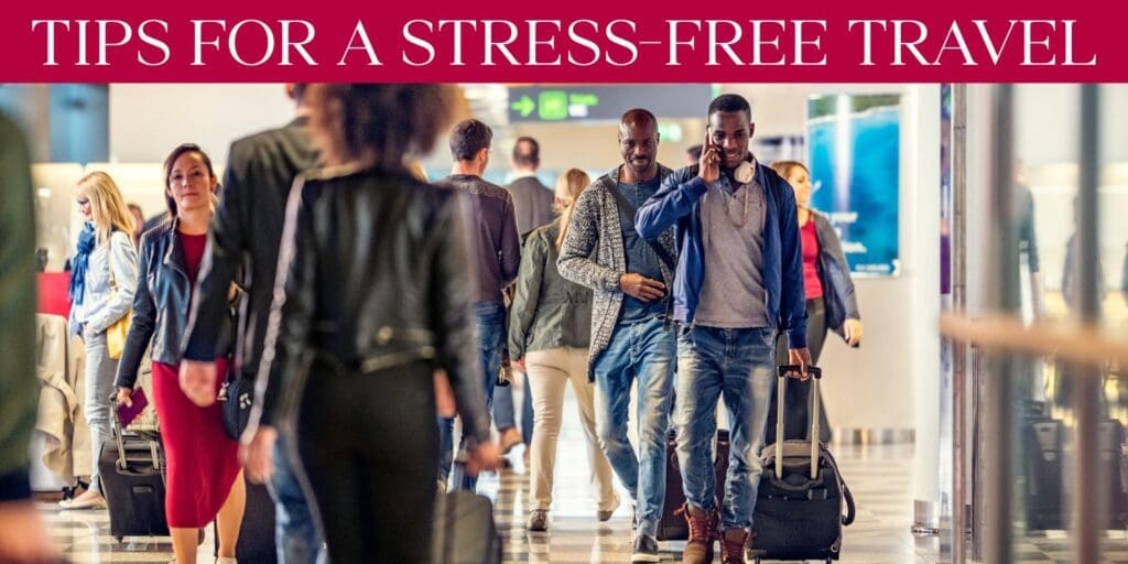 Travelers navigating a busy airport with carry-on luggage, highlighting tips for smooth and stress-free travel.